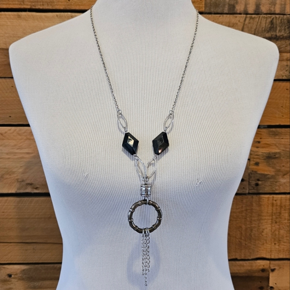 Silvertone Lariat Necklace with Black Diamond Shape Beads and Tassels